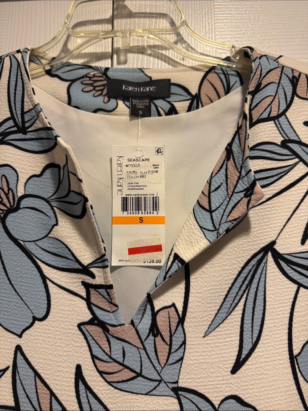 Karen Kane Cream Floral Split-Neck Top with Blue & cream Accents ..size S ..nwt